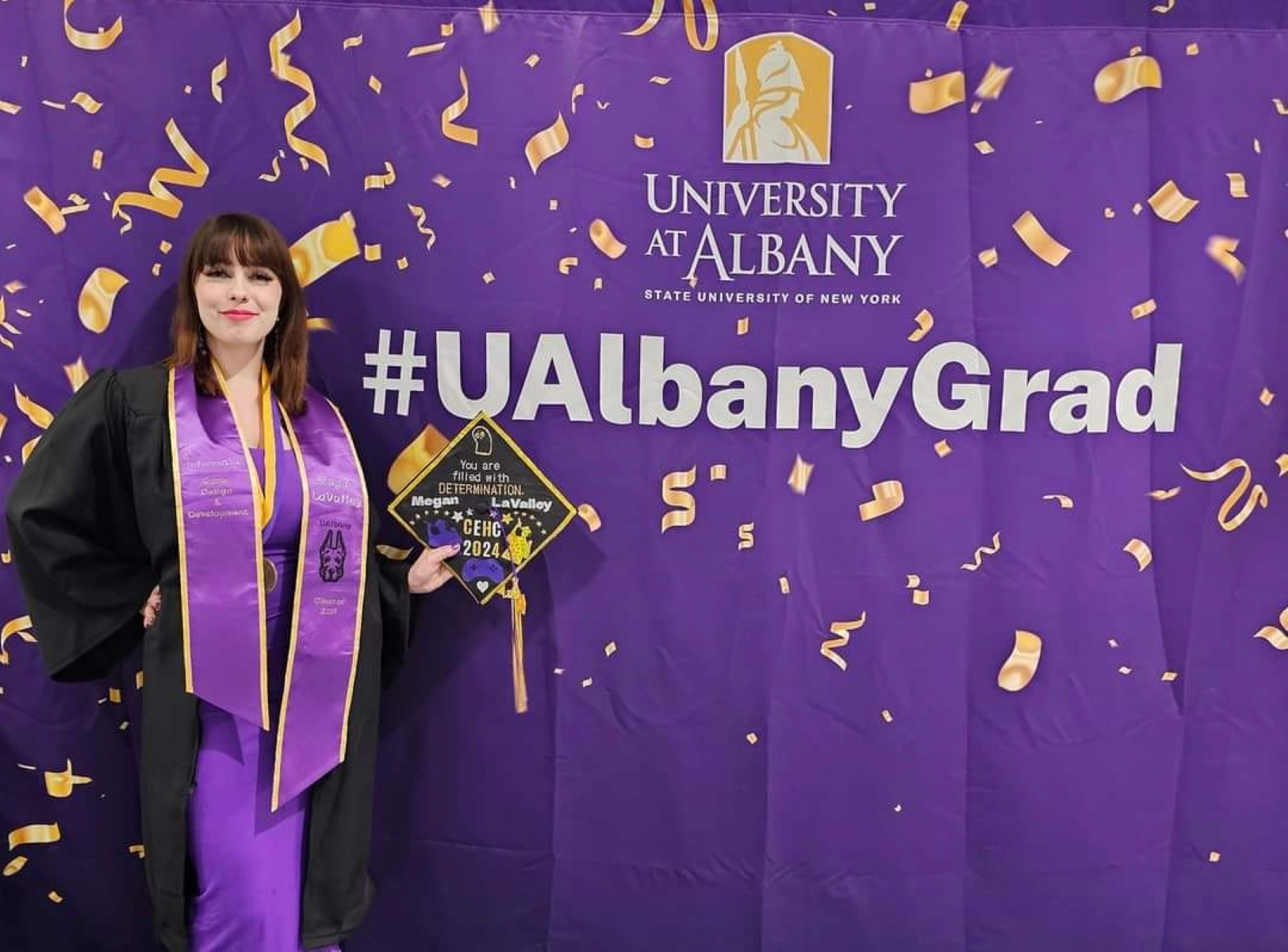 A photo of Megan from her graduation from UAlbany.